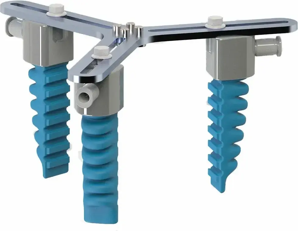angled view showing pneumatic soft gripper with three blue fingers and metal frame