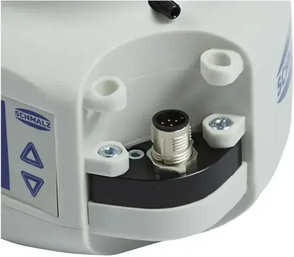 close-up of the Schmalz CobotPump electric vacuum pump connector area showing pins and mounting holes