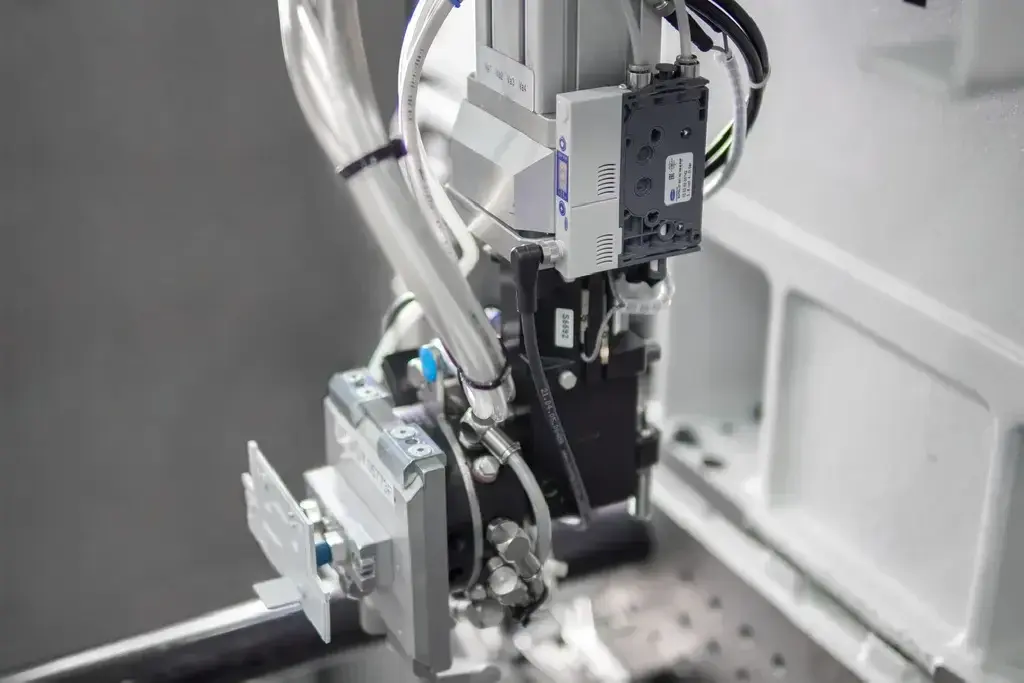 Compact Ejector mounted on laboratory or industrial equipment, visible hoses and cables